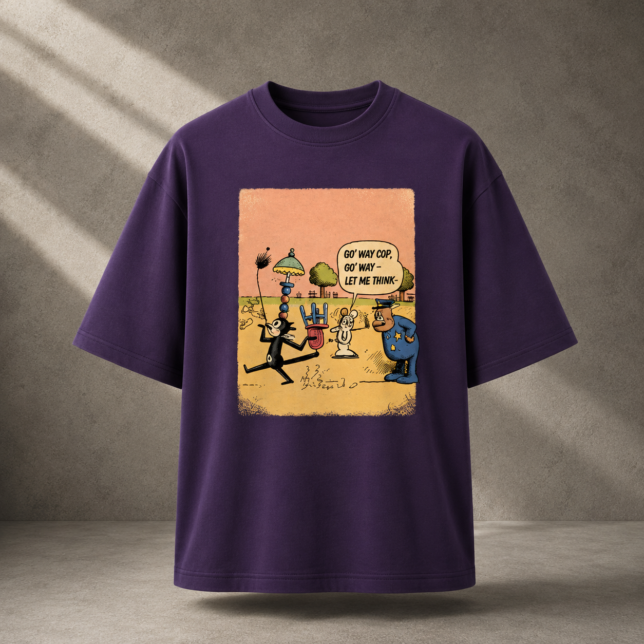 A purple short-sleeve t-shirt with a vintage-style cartoon graphic on the front, displayed against a textured gray wall with diagonal light shadows.